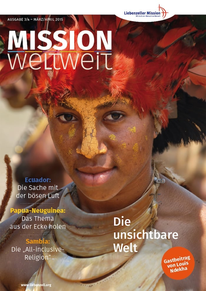 Eine Person mit gelber Gesichtsbemalung und rotem Federkopfschmuck, abgebildet auf dem Titelblatt einer deutschen Missionszeitschrift.