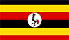 Flagge Ugandas mit schwarzen, gelben und roten Querstreifen und einem grauen Kranich mit Krone in einem weißen Kreis in der Mitte.